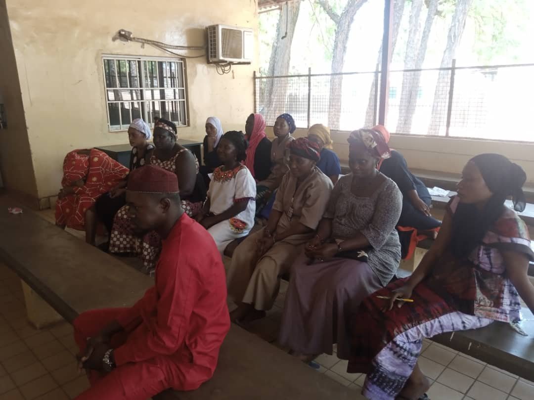 Basse District Hospital Staff listenting attentively