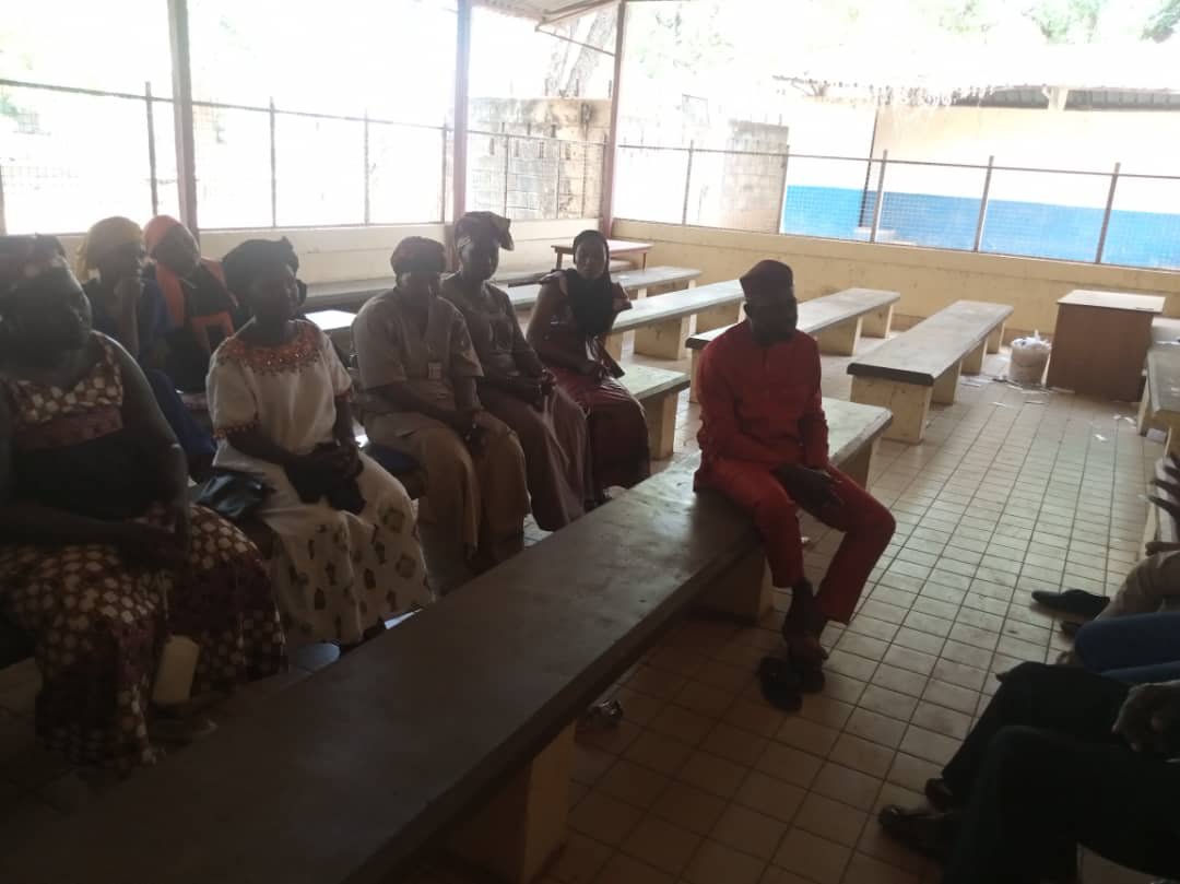 Basse District Hospital Staff listenting attentively